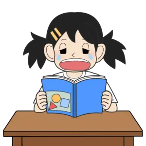 教科書を読む小学生の女の子（泣き）